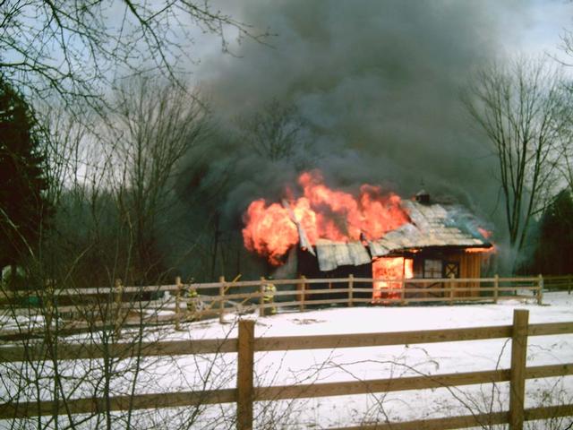 Cheshire Fire Fighters prepare to advance on a small barn fire on Reservoir Road.