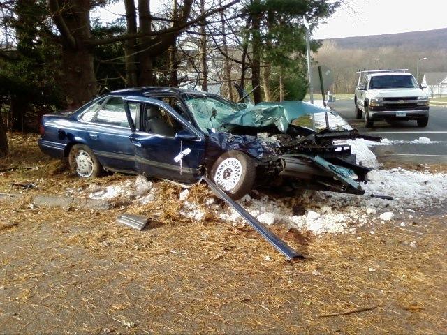 CFD Fire Fighters operate at the scene of a motor vehicle that struck a tree on Moss Farms Road.